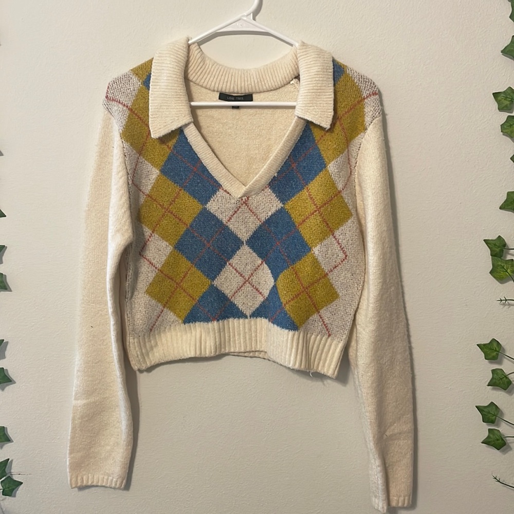 This is a size Large Love Tree collared cropped sweater.